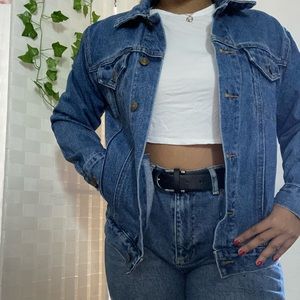 Denim jacket with graphics in the back 🍊